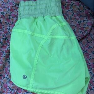 green lululemon shorts